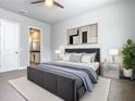 Spacious bedroom with plush bedding and ample natural light at 7770 Sandy Ridge Dr # 18-129, Reunion, FL 34747