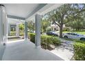 Covered front porch with view of the neighborhood at 11757 Fitzgerald Butler Rd, Orlando, FL 32836