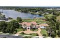 Luxury estate home on lakefront lot with pool and outdoor amenities at 1965 Lake Markham Preserve Trl, Sanford, FL 32771