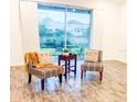 Bright living room featuring tiled floors, large sliding glass door leading to the outdoor patio at 886 Grazie Loop, Davenport, FL 33837
