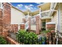 Brick building with stairs and balconies, featuring a courtyard at 5009 Laguna Bay Cir # 41, Kissimmee, FL 34746
