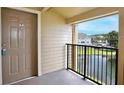 Private balcony overlooking a tranquil lake and community at 4105 Tropical Isle Blvd # 238, Kissimmee, FL 34741