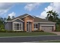 Modern two-story home with brick accents and a three-car garage at 329 Lady Palm St, Apopka, FL 32703