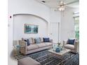 Bright living room boasts neutral decor, stylish furniture, and an airy ambiance perfect for relaxing and entertaining at 570 Cranes Way # 248, Altamonte Springs, FL 32701