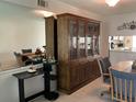 Open-concept living space featuring stylish furnishings and natural light at 3276 Candle Ridge Ct # 202, Orlando, FL 32822