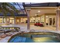 Resort style backyard includes a beautiful pool, spa, and covered patio with amazing views at 3499 Rockcliff Pl, Longwood, FL 32779