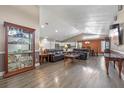 Spacious living room featuring hardwood floors and a vaulted ceiling at 1451 Twin Rivers Blvd, Oviedo, FL 32766