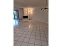 Bright living room with fireplace and tile floors at 11 Escondido Cir # 105, Altamonte Springs, FL 32701