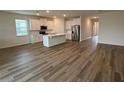 Spacious living room with hardwood floors and an open floor plan at 334 Rover Rd, Ormond Beach, FL 32174