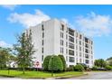 Modern condominium building with landscaped grounds at 213 E Canton Ave # 213, Winter Park, FL 32789