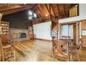 Spacious living room with beautiful hardwood floors, fireplace, and custom wood details at 2459 Adelia Blvd, Deltona, FL 32725