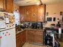 Bright kitchen offers a functional layout with wood cabinets at 6233 Balboa Dr, Orlando, FL 32808