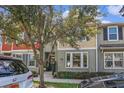 Stylish townhome with colorful facade, well-maintained landscaping, and inviting entryway for a welcoming curb appeal at 1349 Mill Stream Ln, Winter Springs, FL 32708