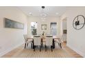 Bright dining room featuring a modern light fixture, stylish table setting, and windows at 1020 W Princeton St, Orlando, FL 32804