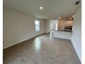 Spacious living room with tile flooring and open floor plan at 3503 Fort Mellon Ln, Sanford, FL 32773