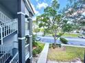 Condo parking lot with a view of a pond at 13803 Fairway Island Dr # 1627, Orlando, FL 32837