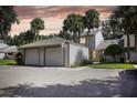 Two-car garage and front yard of charming townhome at 543 Warrenton Rd # 543, Winter Park, FL 32792