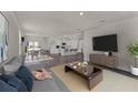 Open concept living space with modern furniture and access to kitchen and dining area at 5511 Stable Mate Dr, Apopka, FL 32712