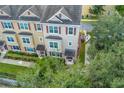 Attractive three-story townhome with unique architectural details at 207 Maplebrook Dr, Altamonte Springs, FL 32714