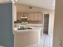 Kitchen with light wood cabinets and a pantry at 267 Tinder Pl, Casselberry, FL 32707