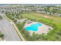 Aerial view of community pool, playground, and common areas at 171 Pheasant Dr, Haines City, FL 33844