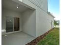 Covered patio with sliding glass doors leading to the interior at 434 Belmond Dr, Debary, FL 32713