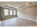 Bright and airy living room with tile floors and ample natural light at 371 Lady Palm St, Apopka, FL 32703
