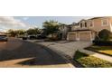 A well-maintained street featuring several homes with two-car garages and neatly landscaped yards at 13910 Dove Wing Ct, Orlando, FL 32828