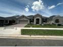Attractive single-story home with a brick driveway and well-maintained landscaping at 5385 Park Guell St, St Cloud, FL 34771