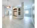 Spacious living room with high ceilings, open floor plan, and lots of natural light at 1945 Piedmont Park Blvd, Apopka, FL 32703