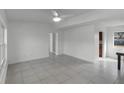 Bright living room with tile floors and access to other rooms at 2313 Savoy Dr, Orlando, FL 32808