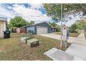 A quaint single-Gathering home with a well-kept lawn and a two-car garage at 3076 Crane Strand Dr, Winter Park, FL 32792