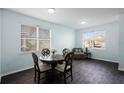 Dining area with a round table and four chairs at 326 Highland Meadows Ave, Davenport, FL 33837