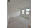 Bright and spacious bonus room with neutral walls and tile flooring at 1200 Bear Oak Ln, Deland, FL 32720