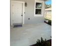Inviting front porch with stylish tile flooring and a welcoming 'HOME' doormat at 388 Chinaberry Ave, Oviedo, FL 32765