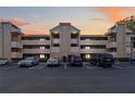 Scenic water view overlooking a serene river with mature trees and manicured lawn at 510 Cranes Way # 306, Altamonte Springs, FL 32701