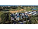Aerial view of homes in a golf community at 7405 Excitement Dr, Kissimmee, FL 34747