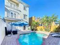 A private pool and patio area offers a relaxing outdoor space at 7405 Excitement Dr, Kissimmee, FL 34747