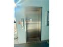 Modern stainless steel elevator in building at 3700 S Atlantic Ave # 315, New Smyrna Beach, FL 32169