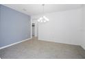 Spacious dining room with chandelier and tile floors at 752 Sandy Bar Dr, Winter Garden, FL 34787