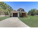 Charming home with attached garage and covered porch at 3260 Se 32Nd Ct, Ocala, FL 34471