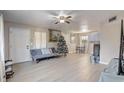 Spacious living room with neutral walls and ceiling fan at 3260 Se 32Nd Ct, Ocala, FL 34471