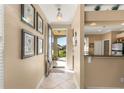 Inviting entryway with tile flooring and views into the living spaces at 8274 Bridgeport Bay Cir, Mount Dora, FL 32757