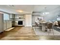 Modern kitchen with stainless steel appliances and light gray cabinets at 707 Saint Matthew Cir, Altamonte Springs, FL 32714