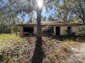Small house with a garage, needs renovation at 6301 State Road 60 E, Bartow, FL 33830