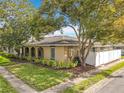 This property features mature trees shading a landscaped yard with privacy fence, enhancing its charm at 542 Cascade Cir # 102, Casselberry, FL 32707