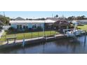 Charming waterfront home with private dock and boat lift at 146 Reef Rd, South Daytona, FL 32119