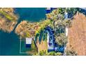 Lakefront property with a boathouse and large lot at 647 Ridgewood Dr, Windermere, FL 34786