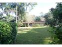 Charming single-story home with a well-kept front lawn at 306 Wild Olive Ln, Longwood, FL 32779