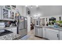 Bright kitchen featuring ample cabinet space and an island at 405 Mallard Ln, Kissimmee, FL 34759